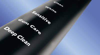 The image displays a black toothbrush settings list with the options: 'Clean', 'White', 'Sensitive', 'Gum Care', and 'Deep Clean'.