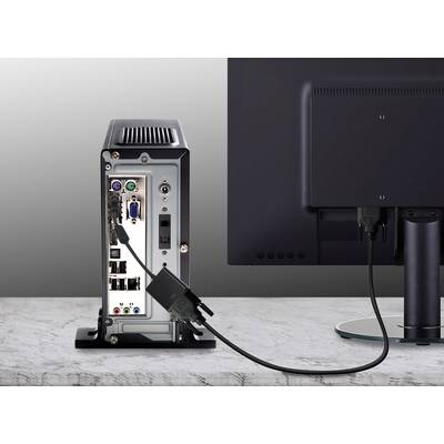 A computer tower and a monitor are connected via an HDMI cable. The rear of the tower shows various ports.