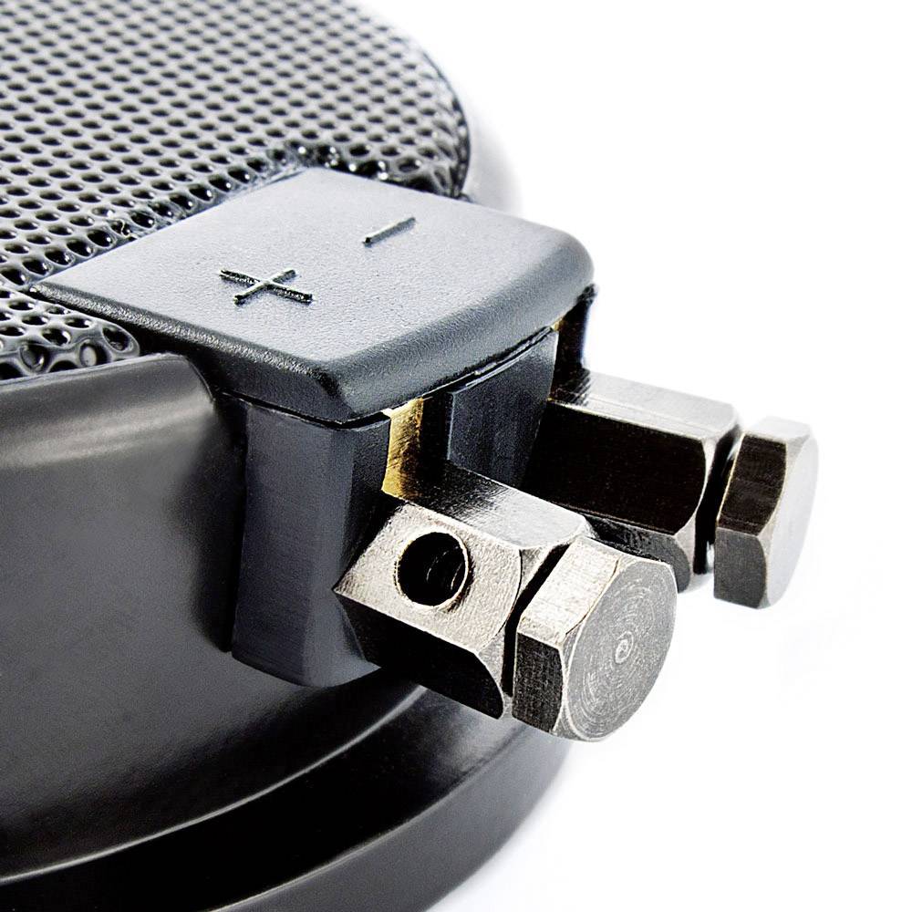 Speaker connection with positive and negative terminals.