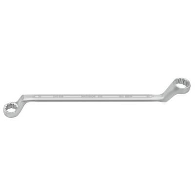 A silver double ring spanner with two differently sized ends for various screws, lies horizontally.