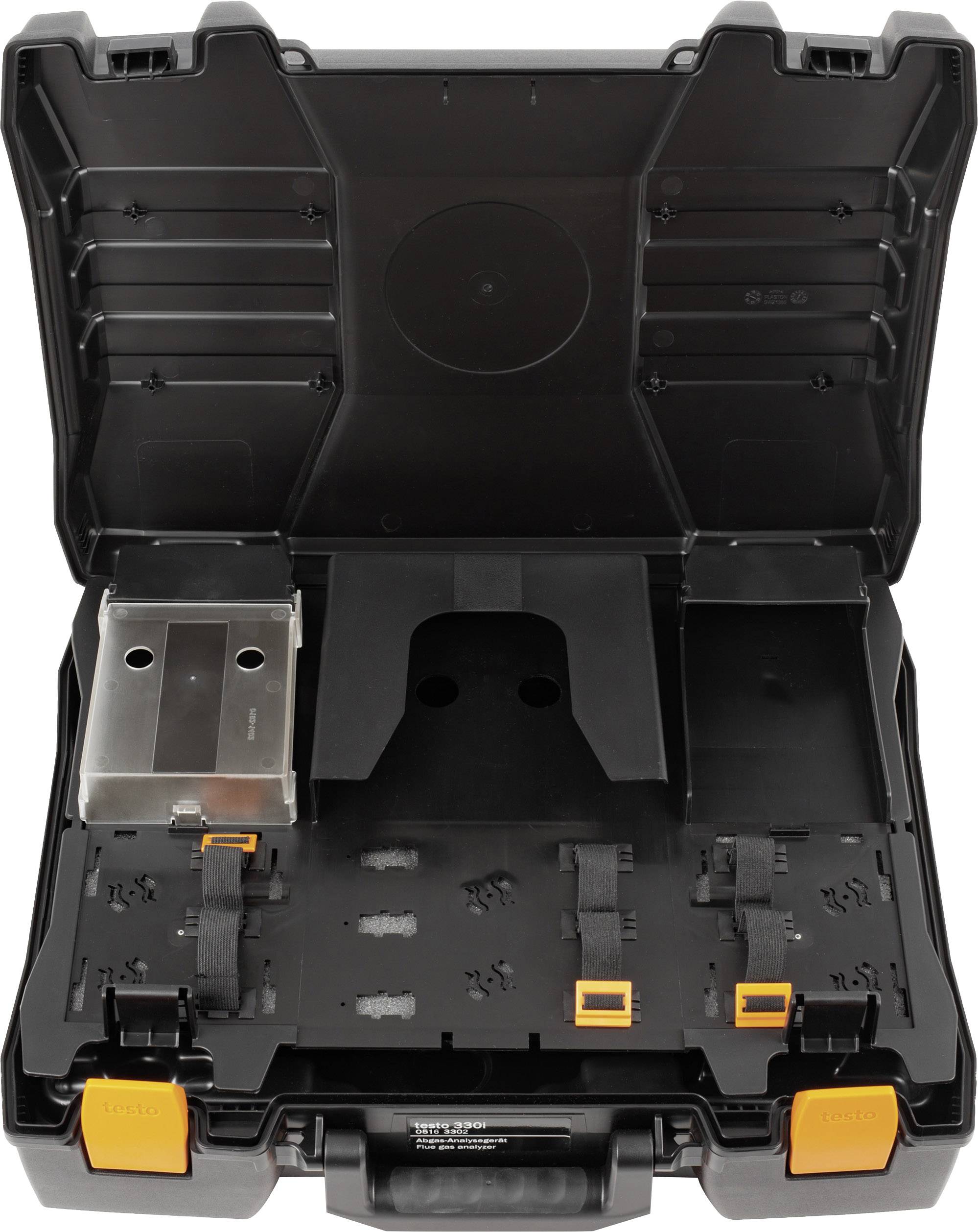 Open black toolbox with compartments and holders for tools, placed on a table.