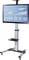 A presentation monitor on a mobile stand displays business graphics with a bar chart and line graph, visualising analytical data.