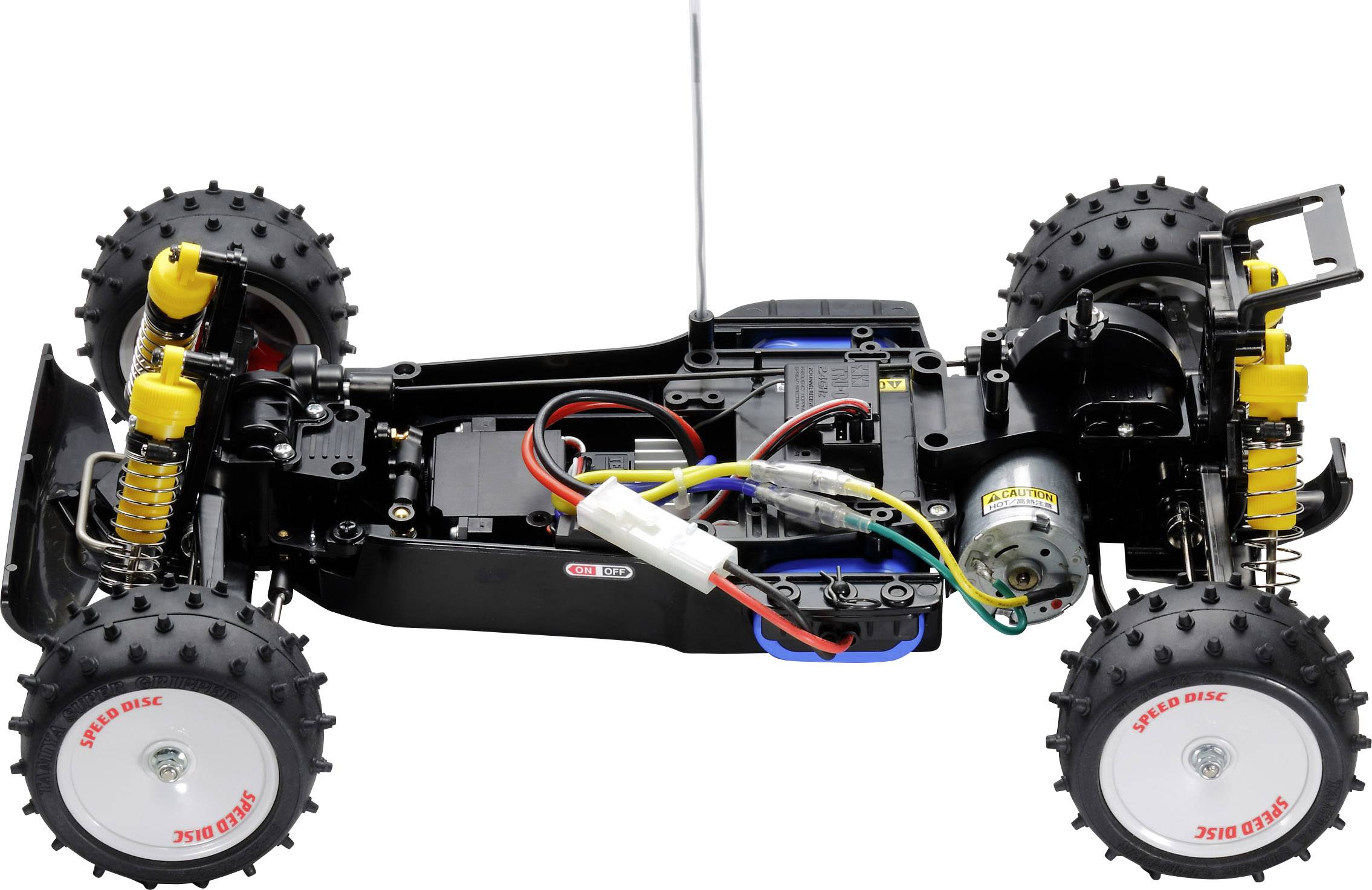Remote-controlled car chassis without bodywork, showing internal components such as engine, suspension, and wiring.