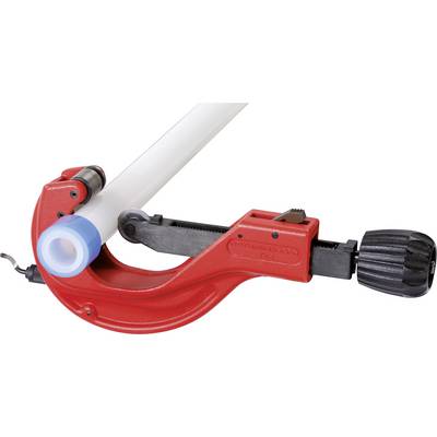 A pipe cutter is cutting a white plastic pipe, demonstrating the tool in action with an adjustable cutting wheel.