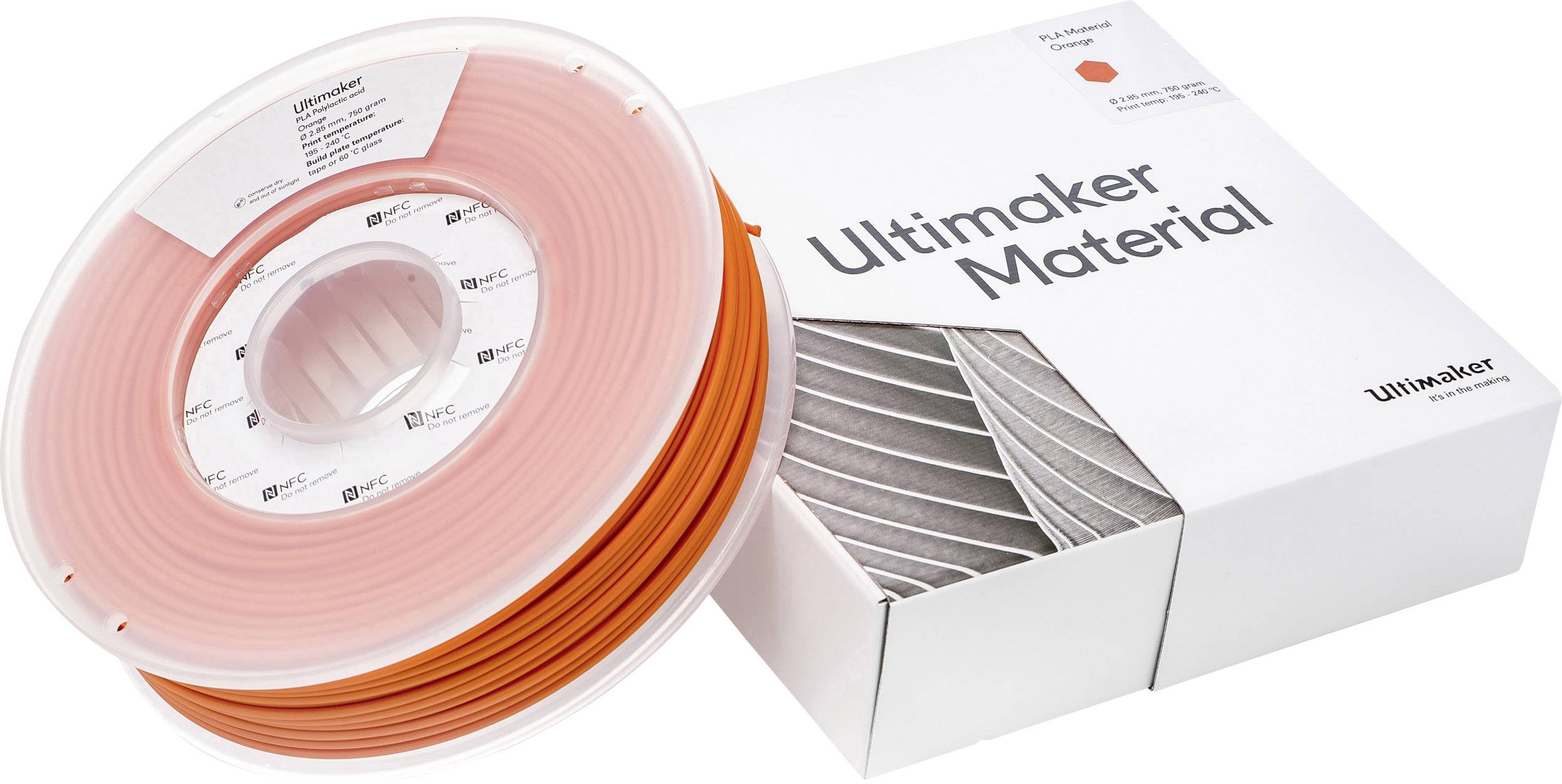 'Ultimaker Material' 3D printing filament on spool and in packaging, orange-coloured. Design and brand visible on the packaging.