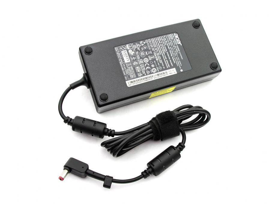A black laptop power adapter with two cables and a label displaying technical specifications.