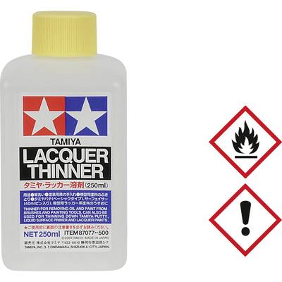'Thinners 250 ml Bottle. TAMIYA Logo. Warning Symbols: Flame and Exclamation Mark, indicating flammability and caution.'