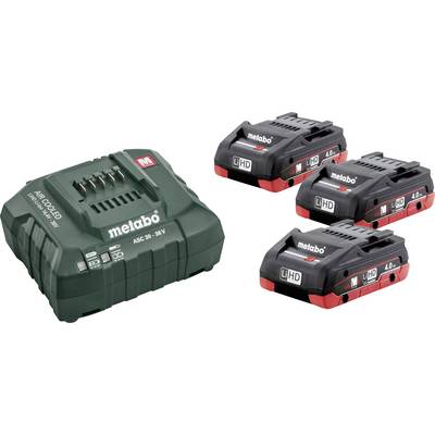 Battery charger by Metabo for batteries from 14.4 to 36V with three 4.0 Ah LiHD batteries. Charger on the left, batteries placed side by side on the right.
