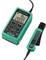 A green digital measuring device with a display showing a reading of '20.00A'. A sensor is connected via cable and is used for current measurement.