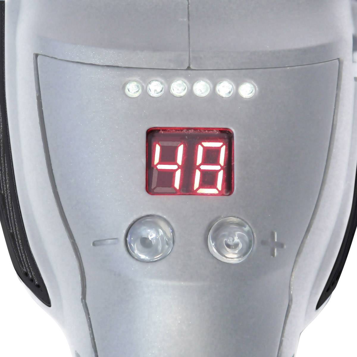 A display on a technical device shows the number '18' in red, surrounded by several small circular lights.