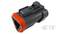 'Black connector with orange seal, positioned sideways. Suitable for sealing and connecting electrical cables.'