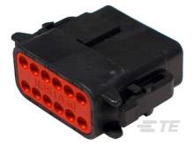 Black plastic plug with red insert and 12 contacts, used for electrical connections.