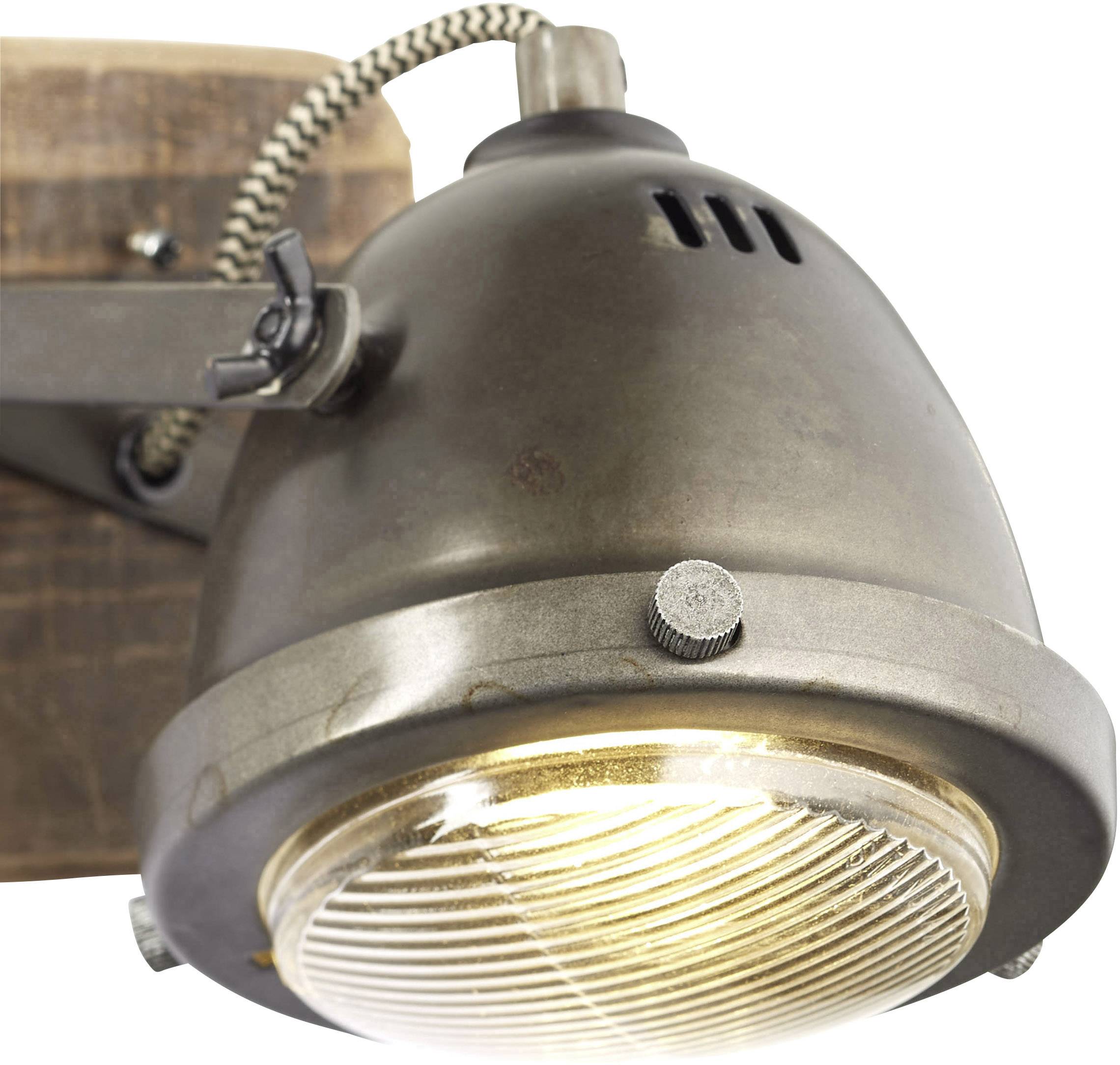Industrial wall light with a bronze-coloured metal shade and wooden base. The lamp is switched on and emits warm light.