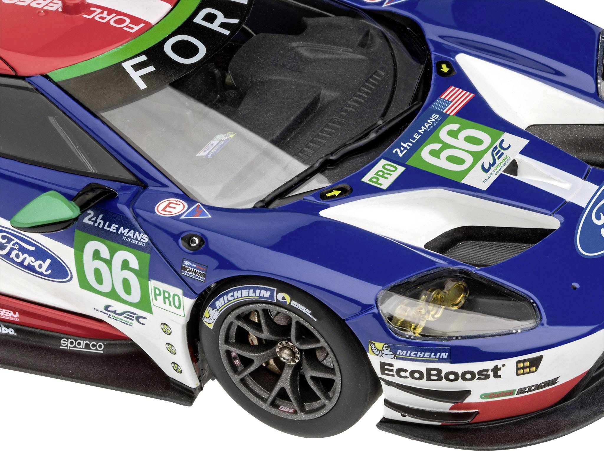 Racing car with blue paintwork and start number '66'. Ford and Michelin logos visible.