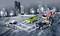 Four toy cars on a city scene. One is a police car, another a fire engine, with the remaining ones being racing cars.