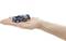 A hand is holding a small toy car, a model of a blue racing car with the number '32', against a white background.