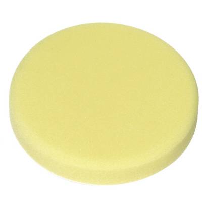 Round yellow sponge on white background. Primarily used for cleaning or polishing.