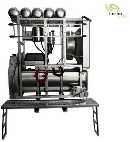 A silver model of a technical machine with pipes, valves, and cables on a platform. The 'thicon models' logo is located in the top right corner.
