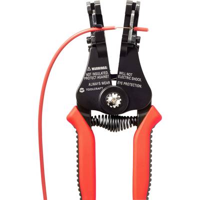 Black and red cable stripping pliers, with warning labels: 'Not insulated, does not protect against electric shock. Always wear eye protection.'