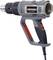 The image shows a grey heat gun with a red handle. The brand 'Kraftpaket' is visible on the side. The device has a mains cable.