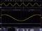 'Oscilloscope screen shows two sinusoidal waves. Top: densely packed with zoom option. Bottom: broader view of the same wave.'