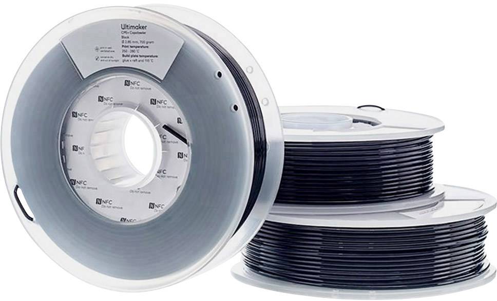 Three rolls of black 3D printer filament, stacked. The front roll displays a label with technical details.