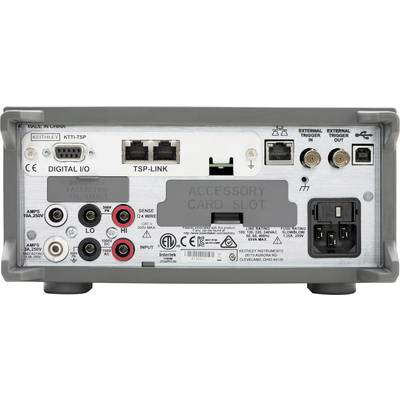 Back of an electrical measuring device with connections for current and voltage inputs, network ports, and an accessory slot.