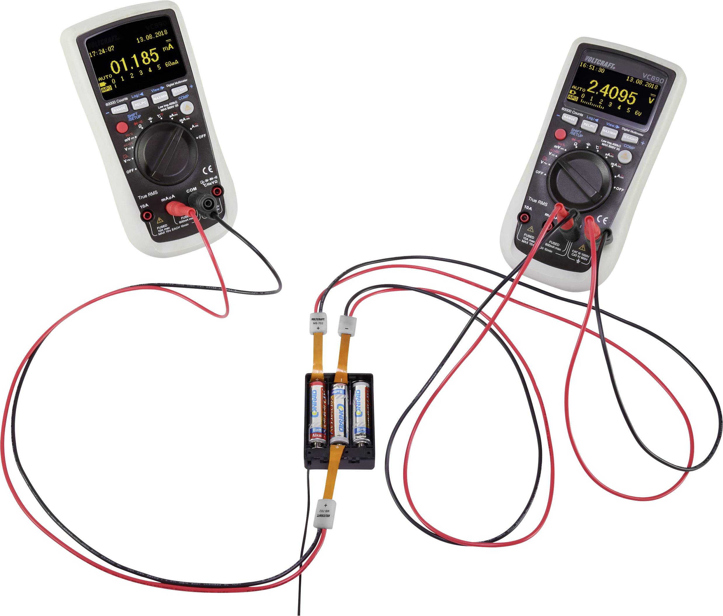 Two multimeters are measuring the current and voltage of a battery circuit. The displays show 1.185 amperes and 2.4095 volts.
