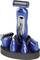A blue electric grooming device with multiple detachable attachments, including trimmers and shavers, stands on a charging dock.