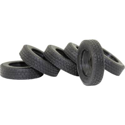 Five black toy tyres are stacked standing and lying in a diagonal line. The tyres have a coarse tread pattern.
