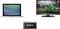 Laptop, television with football match, and HDMI-to-analogue converter.