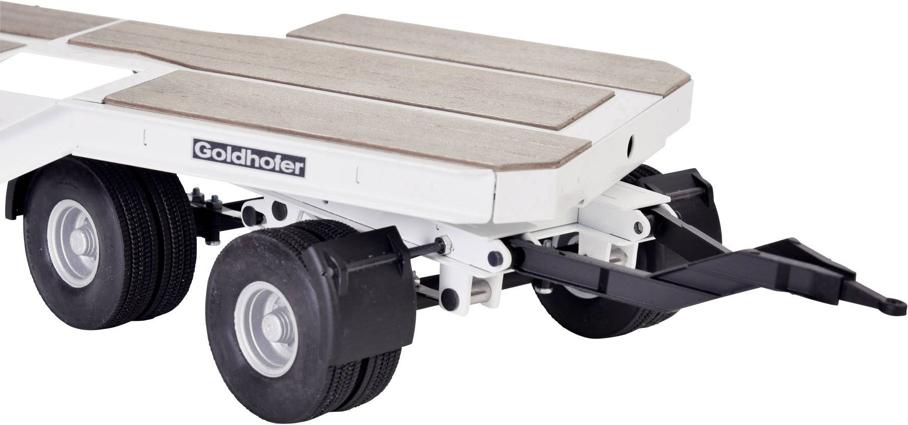 A trailer with four wheels and a 'Goldhofer' logo, constructed from white metal parts and brown wooden surfaces. Suitable for model building.