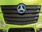 Green lorry with Mercedes star and 'Actros' lettering on the front.