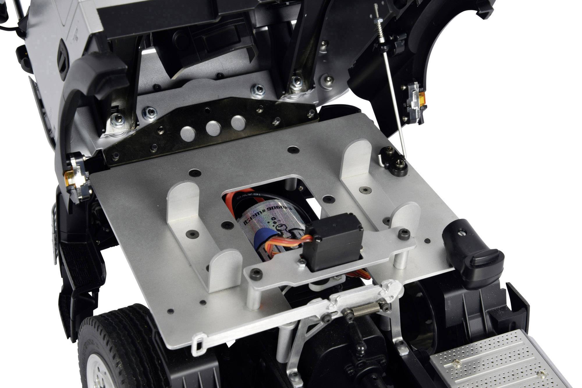 A fold-out section of a battery-powered device that reveals the internal mechanism and electrical wiring.