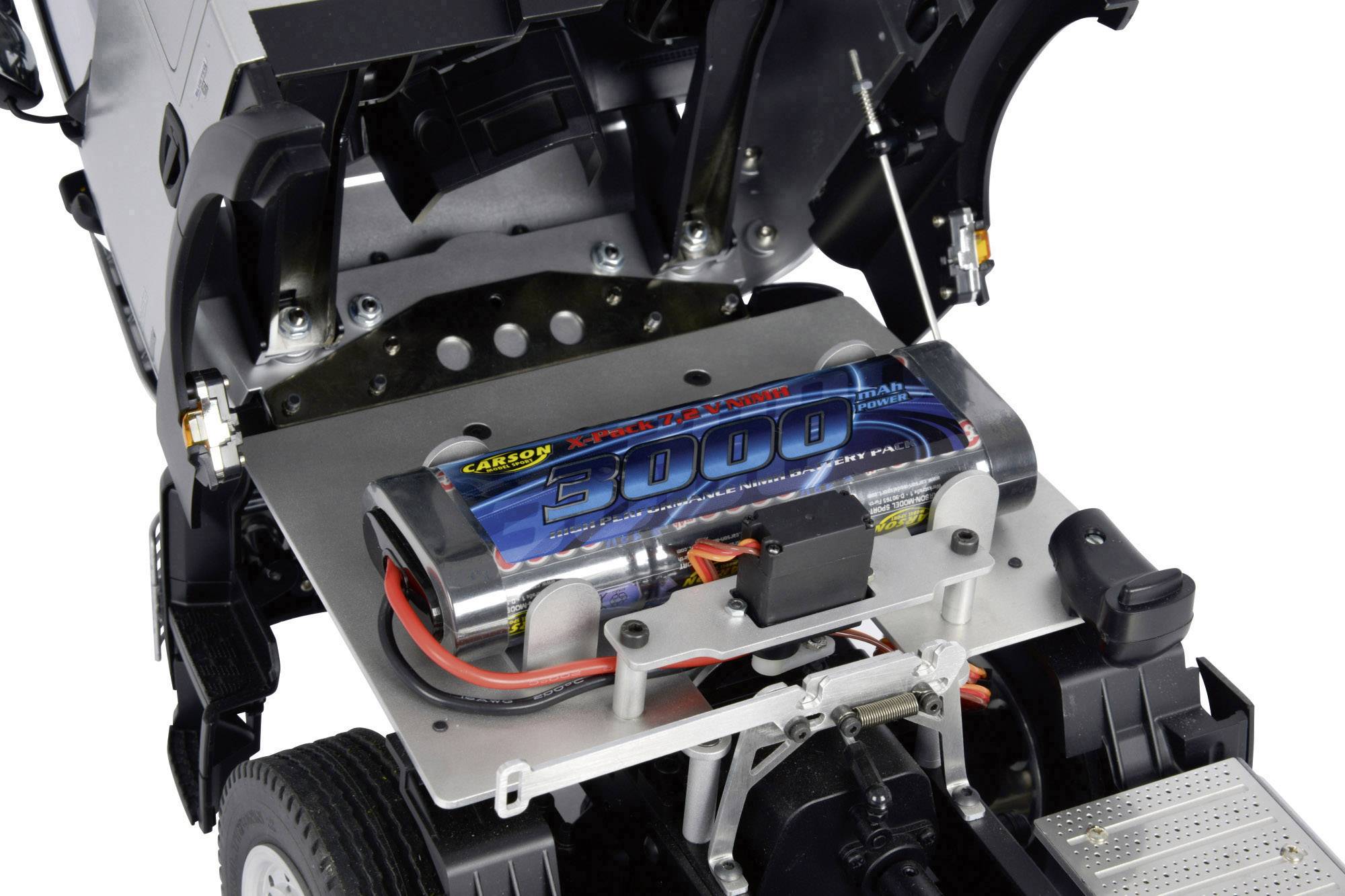 A remote-controlled car with an open cover reveals a large battery, marked with '5000', installed on the back of the vehicle.