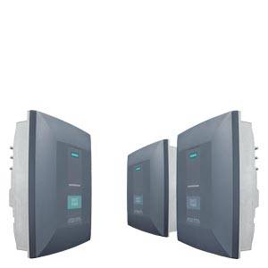 Four grey electronic devices with displays, arranged side by side. They are identical and could be part of a control system.