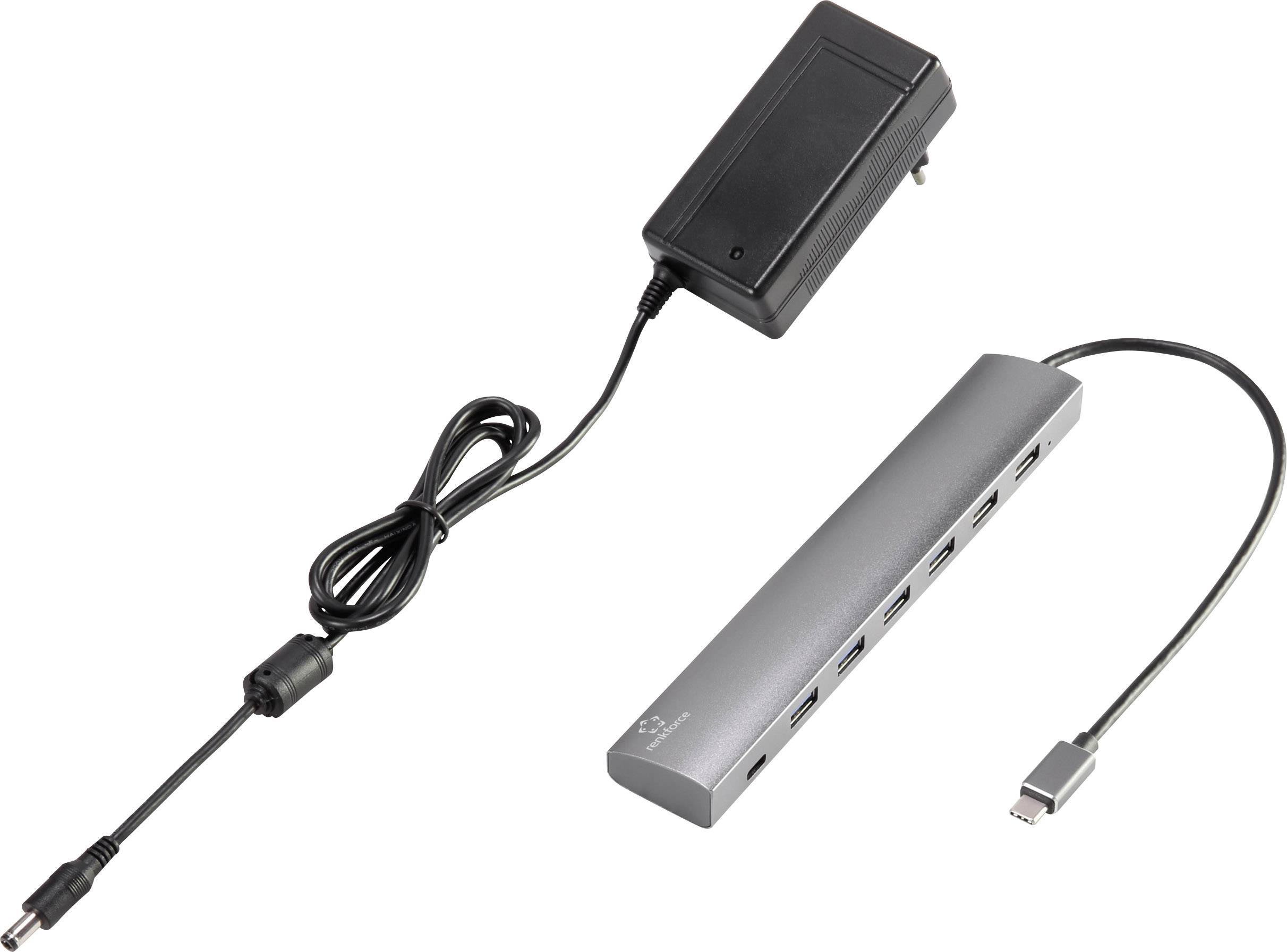 USB-C Hub with multiple ports and matching power adapter, connection cable pointing to the hub, suitable for various device connections.