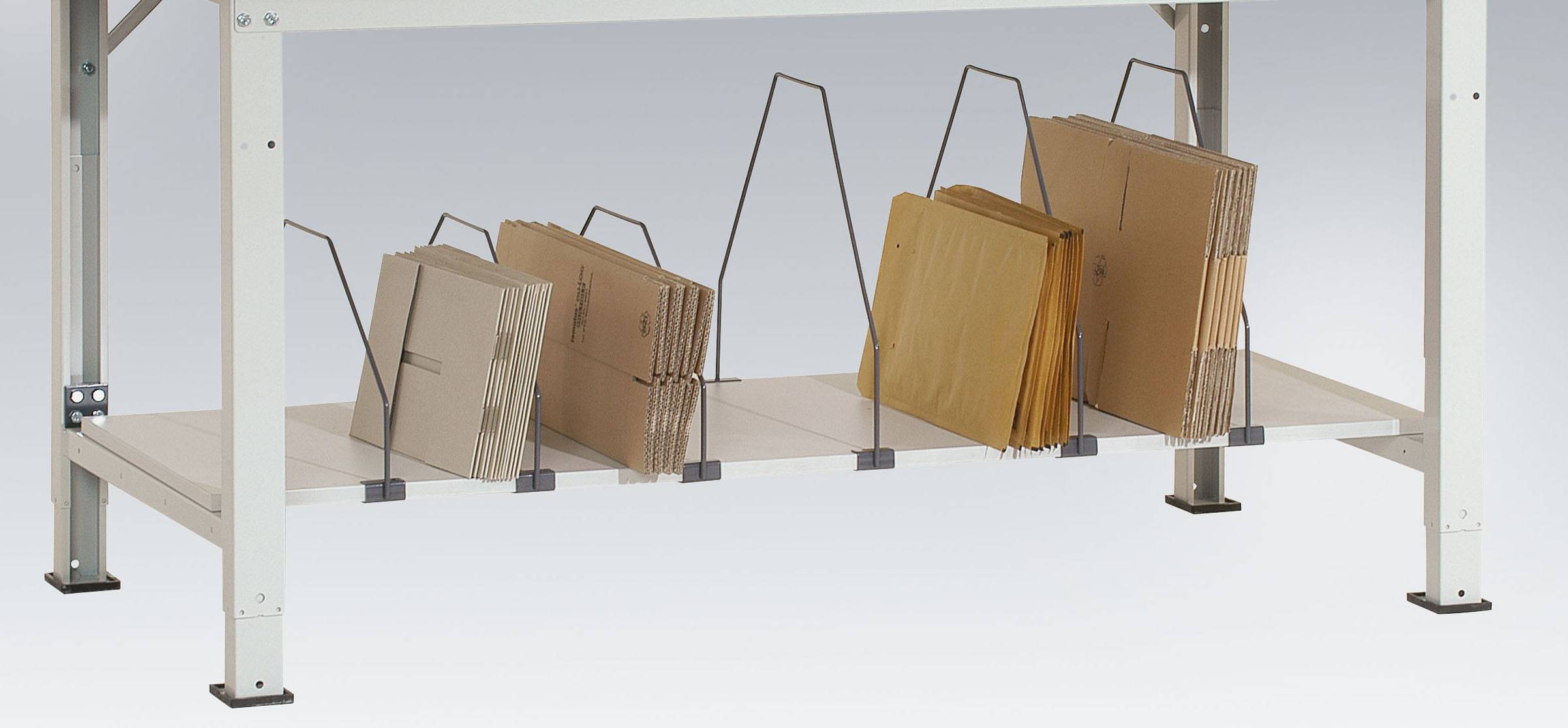 Beneath the table, vertical dividers are positioned to hold upright filled folders and document wallets.