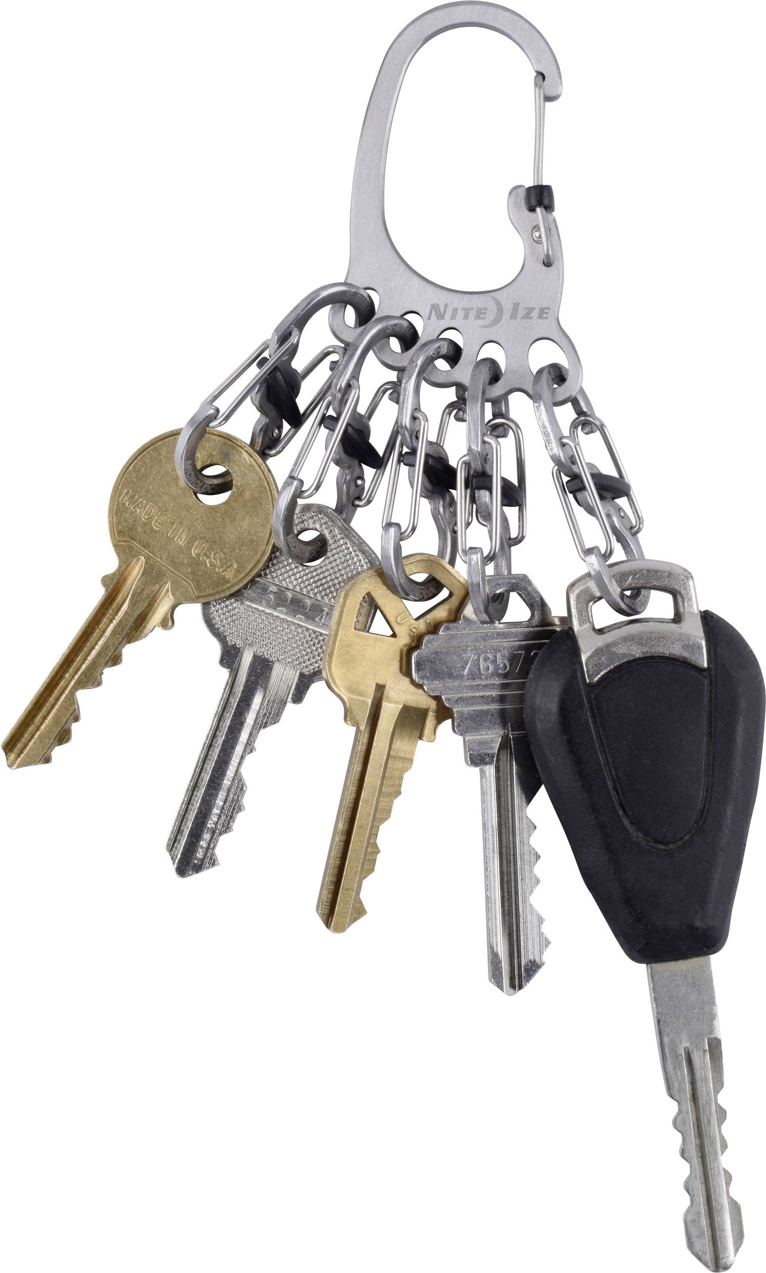 A keyring with six different metal keys, including a black car key, attached to a silver carabiner.