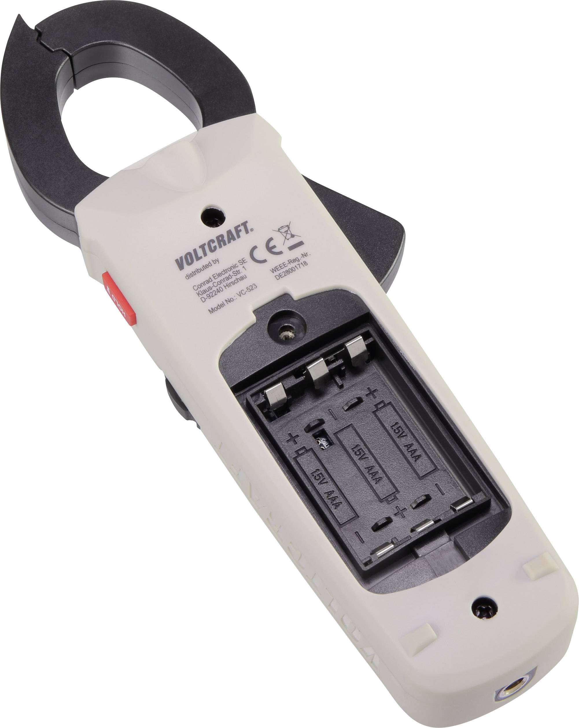 Hand-held Multimeter Volcraft VC-521, battery compartment open and visible. Tool for measuring electrical voltage and current.