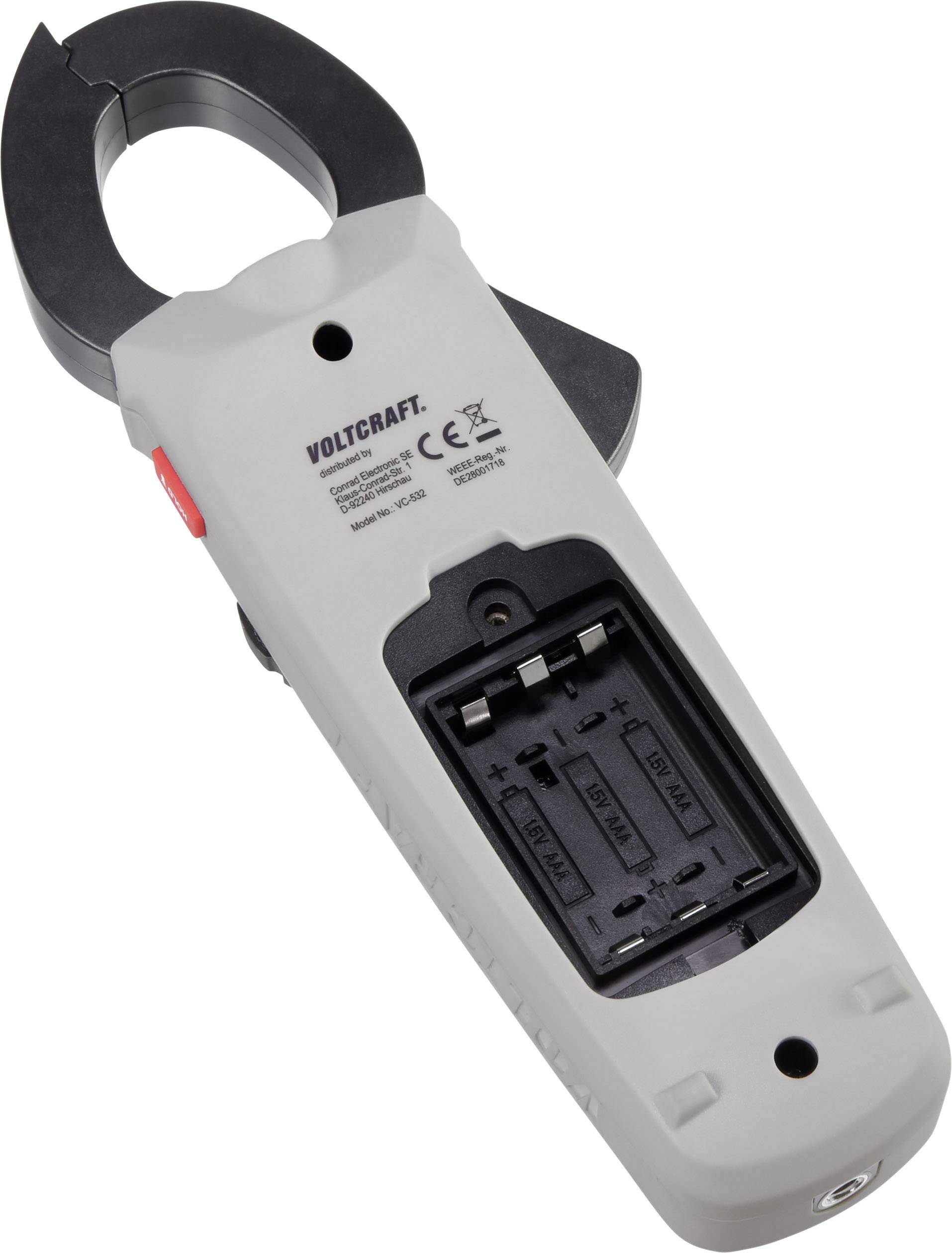 A digital voltage tester by Voltcraft with an open battery compartment that provides space for four AAA batteries.