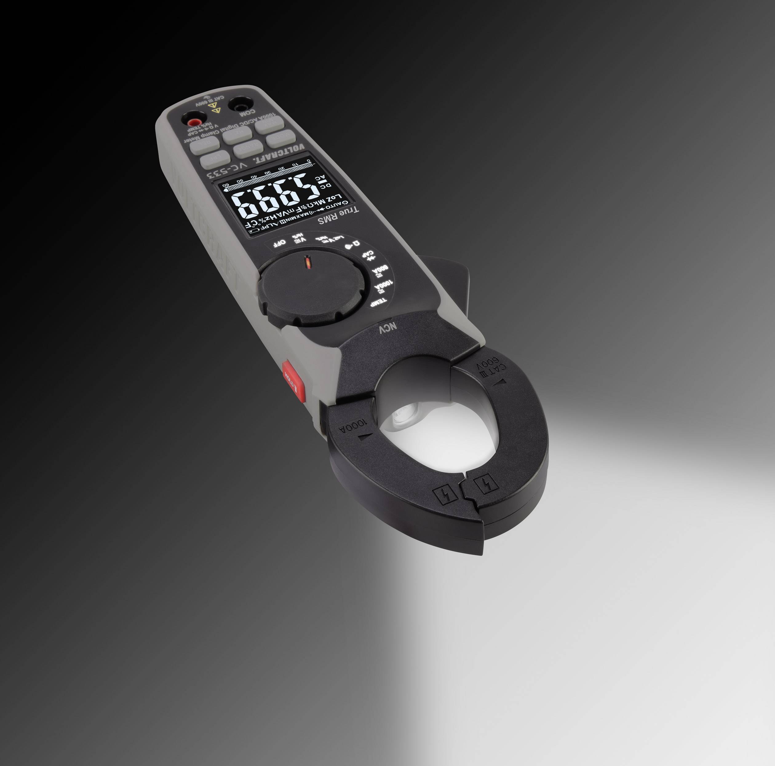 A digital calliper with a display shows measurements. The background is grey, with the device in focus.