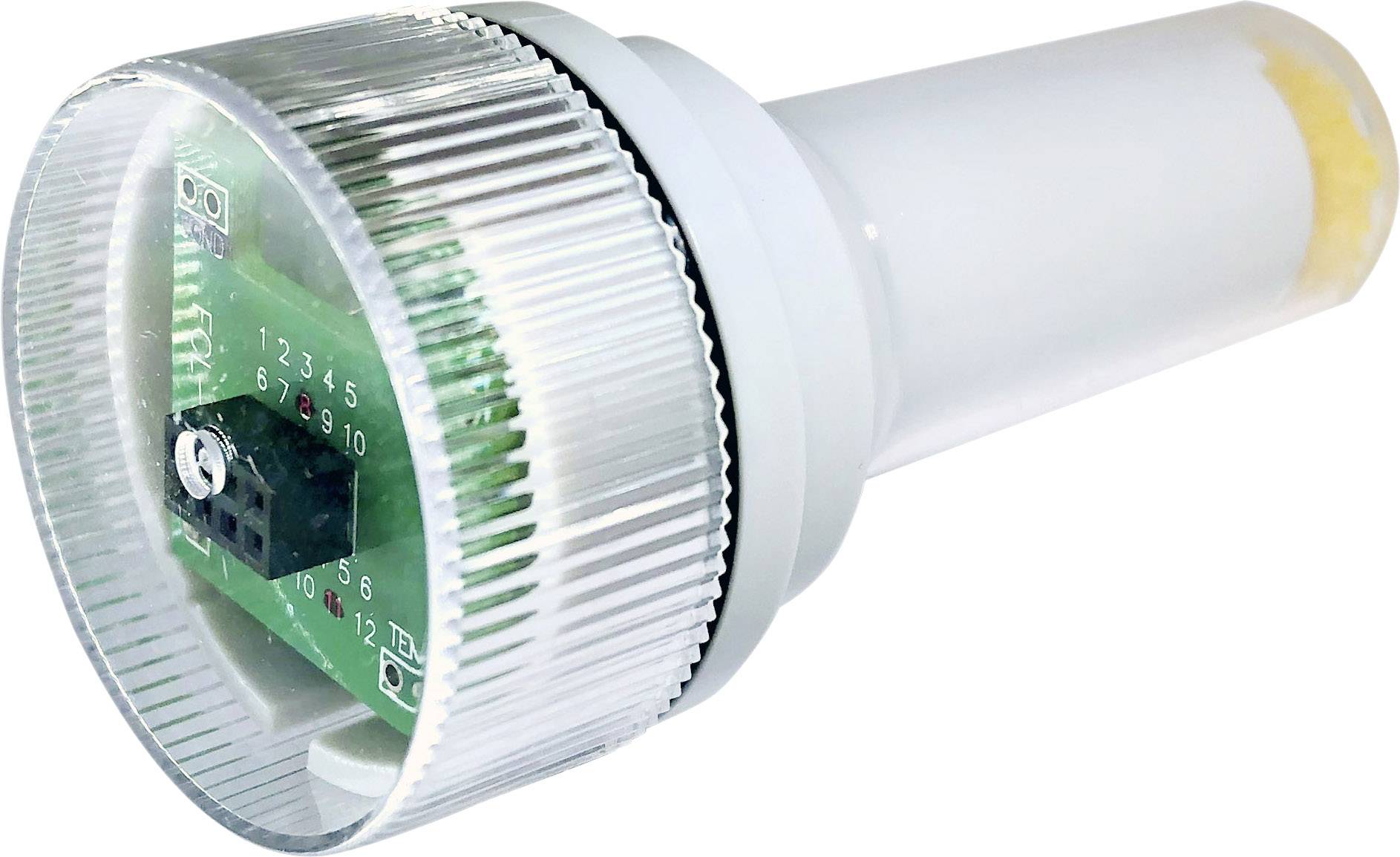 An electronic device with a transparent casing reveals a circuit board with numbers from 1 to 9 and a plug.