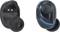 Two wireless black earbuds with blue accents; one showing the front with a button, the other displaying the back with charging contacts.