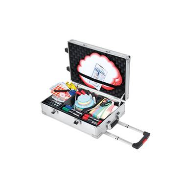 'Aluminium case with open compartments, filled with various painting and drawing materials such as brushes, paints and palettes.'