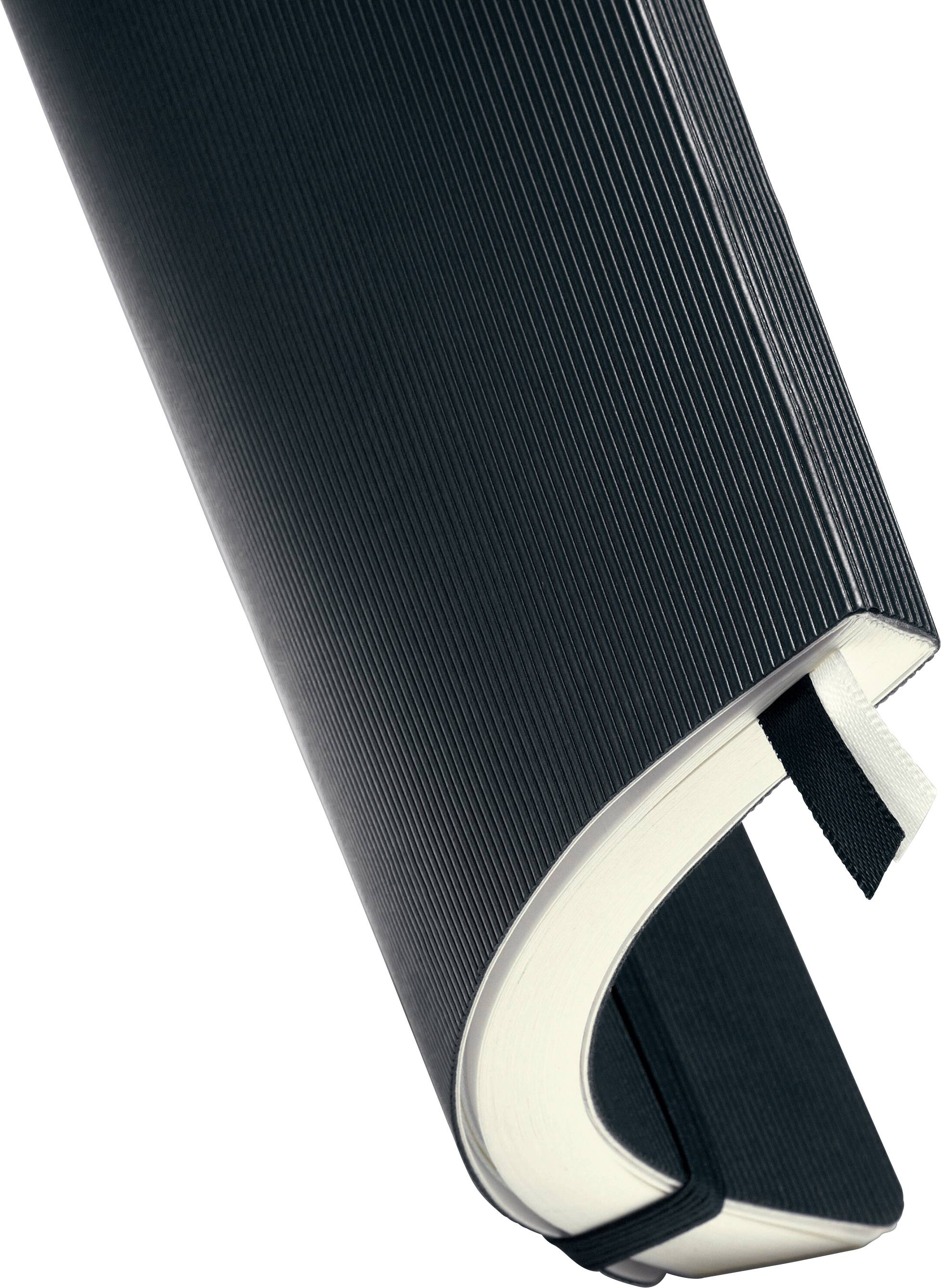 An open book with a black cover and white paper, floating in an elegant arc in the air.