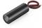 Cylindrical black electric motor with red and black connecting cables, lying horizontally.