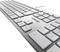 A modern computer keyboard in close-up, looking immaculate and functional. The manufacturer's logo is visible.