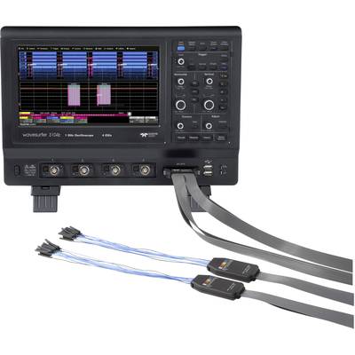 A digital oscilloscope with a colour display shows measurement data. It features multiple controls and ports on the front panel.