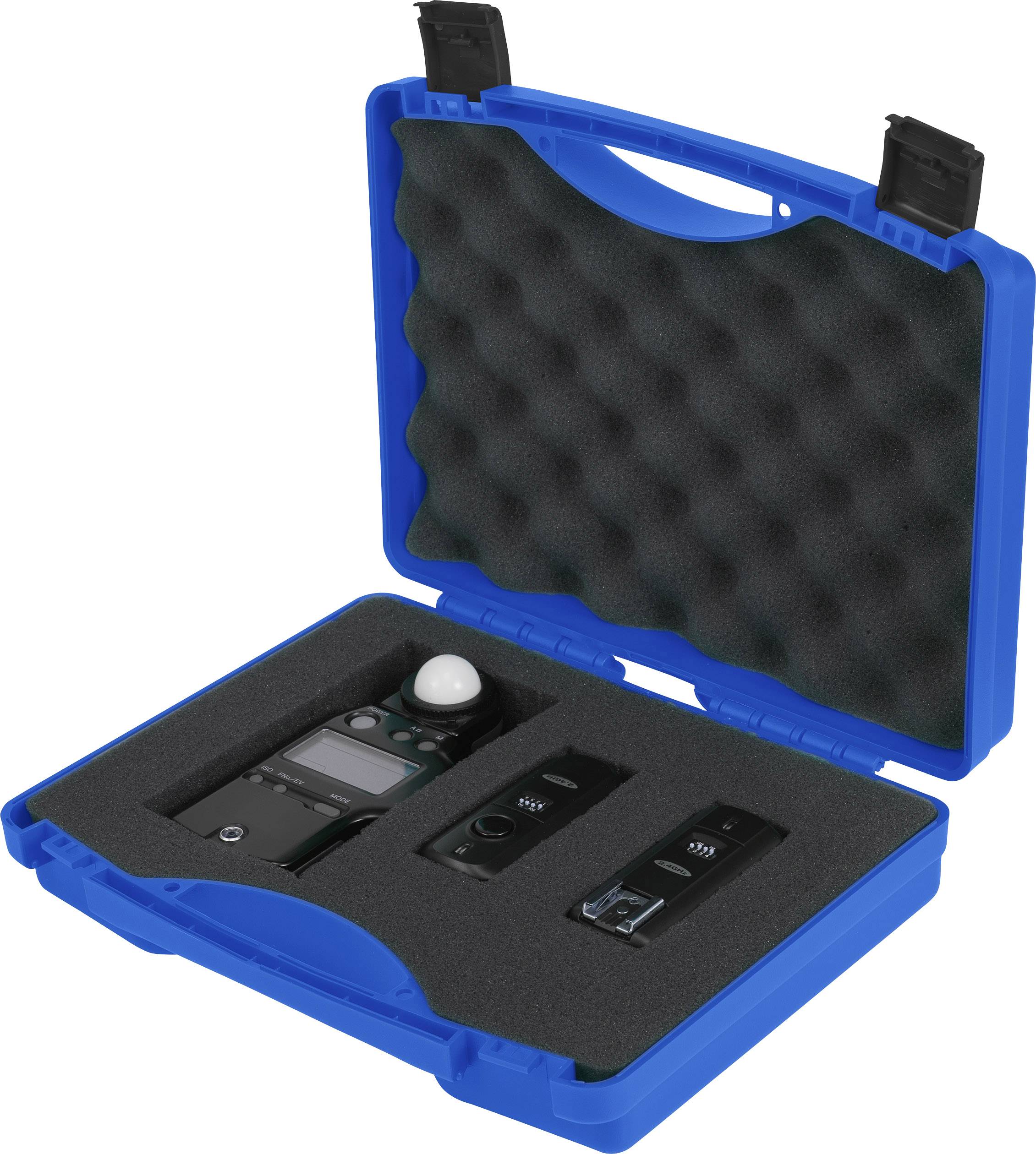 Blue case with foam lining, containing three electronic devices, including an exposure meter and two accessories.